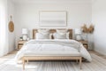 A Scandinavian-inspired bedroom with a luxurious upholstered bed, crisp white linens, and soft neutral tones. Royalty Free Stock Photo
