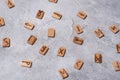 Scandinavian magic runes made of oak on concrete.