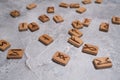 Scandinavian magic runes made of oak on concrete.