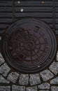 Scandinavian manhole in its urban surrounding.