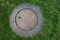 Scandinavian manhole in its urban surrounding.