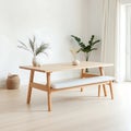 A Scandinavian style dining bench with clean lines featuring light wood and soft fabric placed in a neutral toned room with a