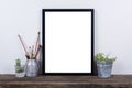 Scandinavian style empty photo frame mock up. Minimal home decor Royalty Free Stock Photo