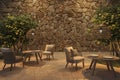 Scandinavian style outdoor terrace cafe with wicker furniture and trees. Night lighting. Mock up stone wall. 3d render Royalty Free Stock Photo