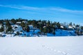 Scandinavian winter amazing  landscape. Footprints of people in the fresh snow. Royalty Free Stock Photo