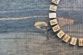 Scandinavian wooden runes on an old wooden table. Elder Futhark