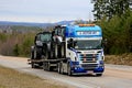 Scania Semi Trailer Hauls Farm Tractors
