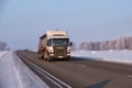 Scania truck on road M52 Chuysky Tract in winter season