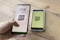 Scanning QR code with mobile smart phone. checking qr code on the mobile phone Royalty Free Stock Photo