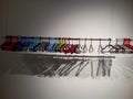 Escape room art by Venezuelan artist Pepe LÃÂ³pez performing empty hooks