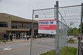 People wait in line for a Covid-19 test in Scarborough