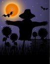 Scarecrow black silhouette in the night sky and the moon Royalty Free Stock Photo