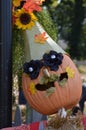 Scarecrow with pumpkin face Royalty Free Stock Photo