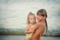 Scarecrow sister lovingly embraces his sister with Down syndrome Royalty Free Stock Photo