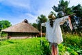 Scarecrow and traditional hut Royalty Free Stock Photo
