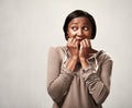 Scared black woman. Royalty Free Stock Photo