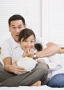 Scared Couple Watching TV Royalty Free Stock Photo