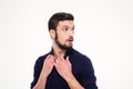 Scared dazed handsome young man with beard in sweetshirt Royalty Free Stock Photo