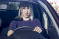 Scared driver driving a car before an accident Royalty Free Stock Photo