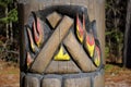 Scared Fire carving on the Totem Pole at the East Gate, Algonquin Park.