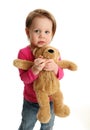 Scared girl holding a teddy bear Royalty Free Stock Photo