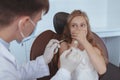 Beautiful young girl visiting dentist