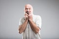 Scared man biting his nails because of fear Royalty Free Stock Photo