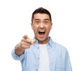 Scared man shouting and pointing finger on you Royalty Free Stock Photo