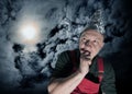 Scared suspecting man waiting for aliens Royalty Free Stock Photo