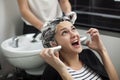 Scared woman in a hair salon