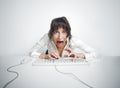 Scared woman at her office desk