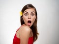 scared woman with open mouth flower in her hair surprised face model Royalty Free Stock Photo