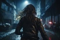 Scared woman runs down dark city street at night alone, back view of adult girl escaping in rain. Lost female person like in