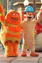 Scarers from the Pixar movie Monsters, Inc. in a parade at Disneyland, California