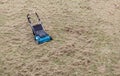 Scarifying lawn with scarifier, scarifies the lawn and removal of old grass Royalty Free Stock Photo