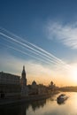 Scarlet glow of the sunset over the Moscow River with boat Royalty Free Stock Photo