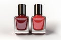 Scarlet nail enamel bottle set against pure, minimalist white surface