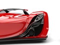 Scarlet red awesome race super car - headlight extreme closeup shot Royalty Free Stock Photo