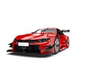 Scarlet red modern super race car - front view closeup shot Royalty Free Stock Photo