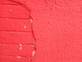 Scarlet red paint old cracked concrete background,  wall background Royalty Free Stock Photo