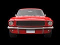 Scarlet red vintage American muscle car - front view closeup shot Royalty Free Stock Photo