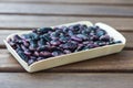 Scarlet runner beans on a wooden table Royalty Free Stock Photo