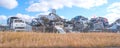 Scarped cars at a vehicle junk scrapyard Royalty Free Stock Photo
