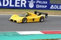 Scarperia, Mugello - 28 August 2020: Historic yellow Prototype Ferrari 333SP in action at the Mugello Circuit.