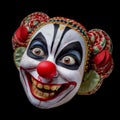 scarry clown face isolated on black background