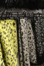 Scarves on racks in fashion store,close up Royalty Free Stock Photo