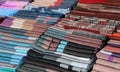 Scarves and stoles and fabrics for sale in Italian shop