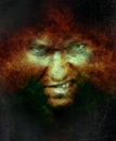 Scary angry male face over hell fire