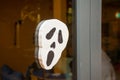 Scary artificial hand made decoration of scream face in the kids club during Halloween