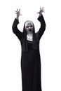Scary asian nun raise up hand want to scare